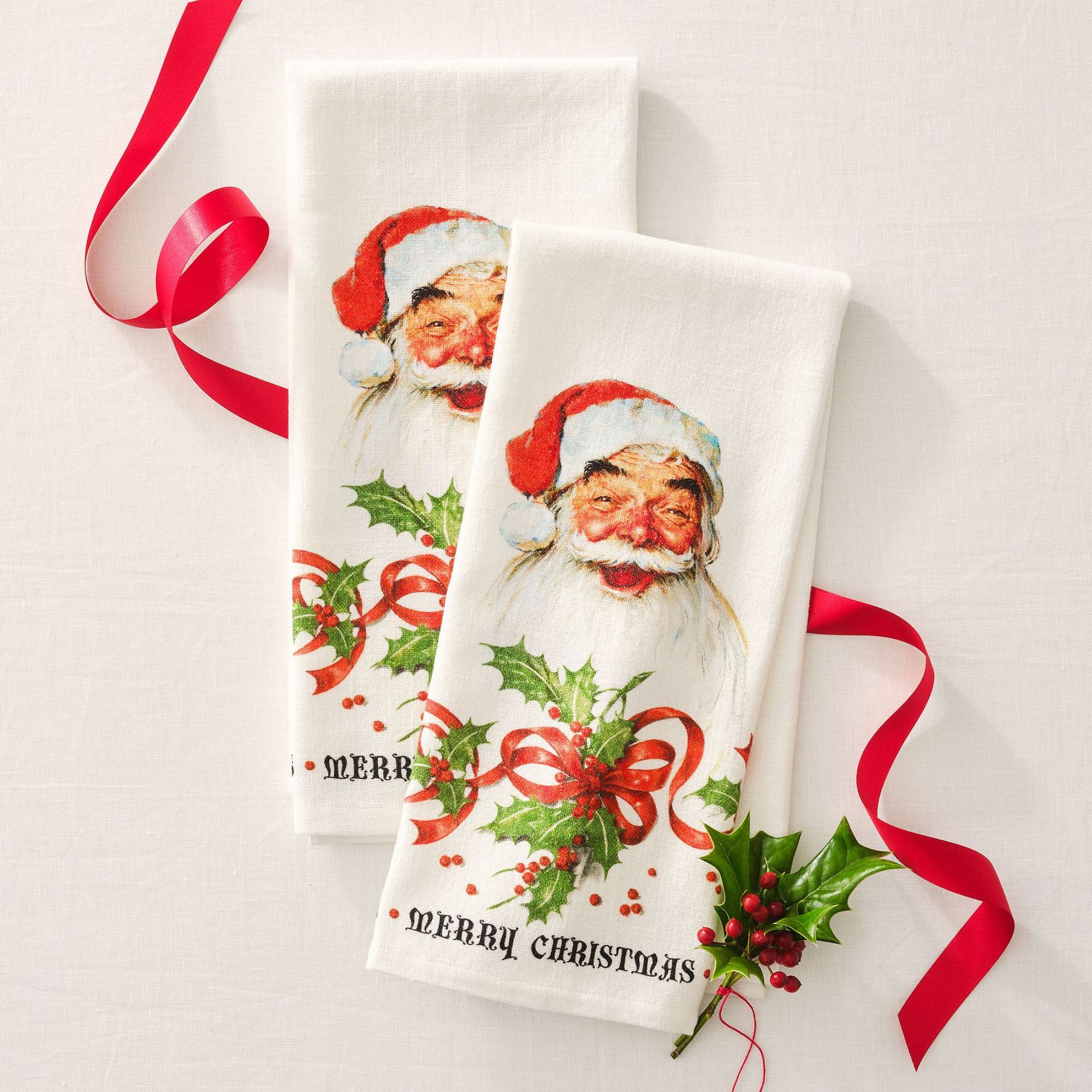 Tea towels with Norman Rockwell Santa illustration