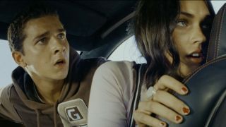 Megan Fox's Mikaela Banes and Shia LaBeouf's Sam Witwicky, inside Bumblebee and on the run in Transformers (2007) .