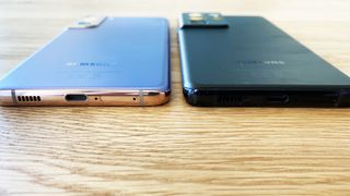 A Samsung Galaxy S21 Plus next to a Galaxy S21 Ultra