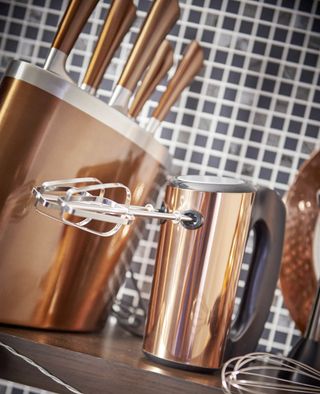 Wilko copper colored hand mixer