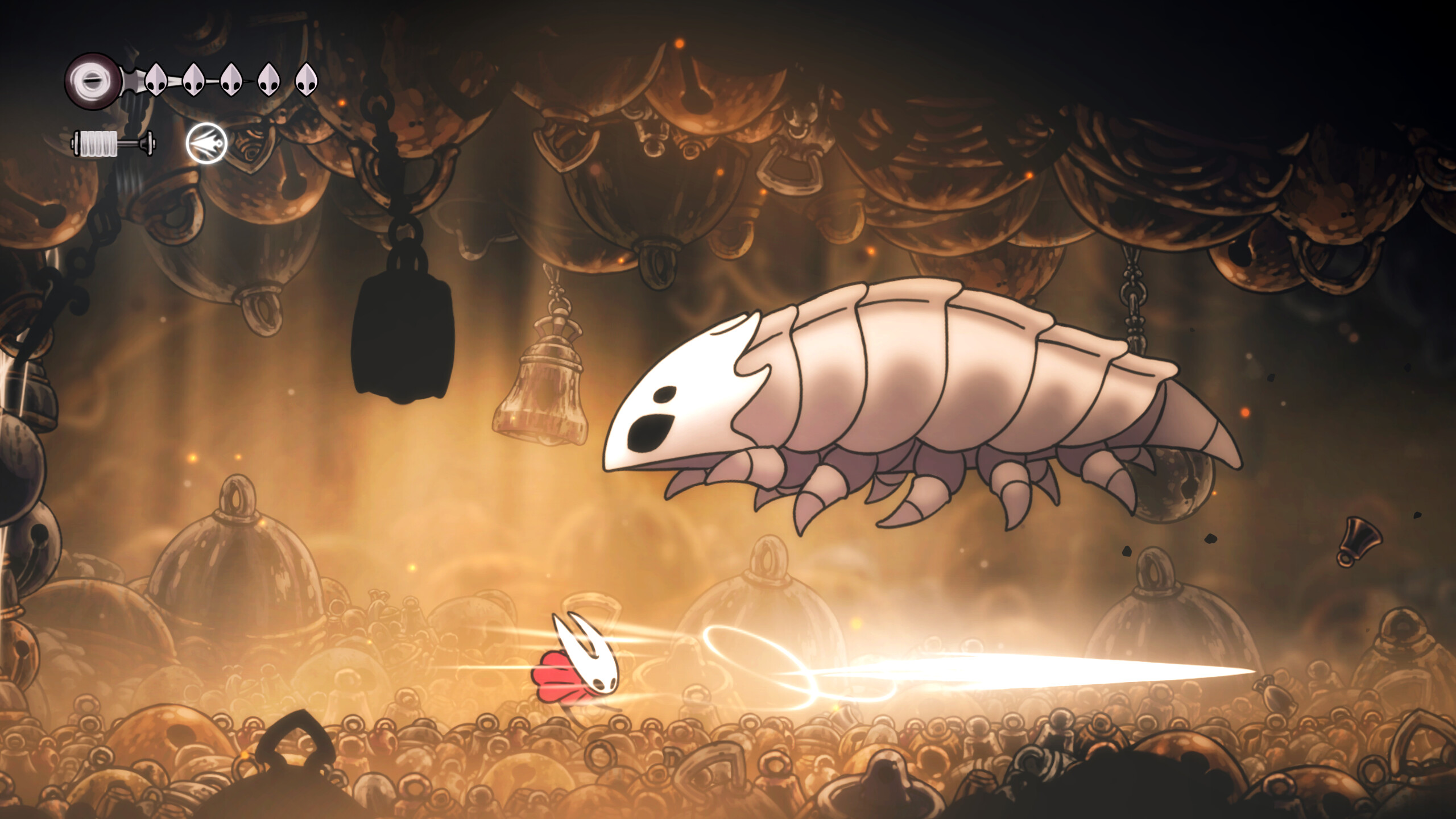 Hollow Knight: Silksong gameplay showing second boss Bell Beast leaping at Hornet
