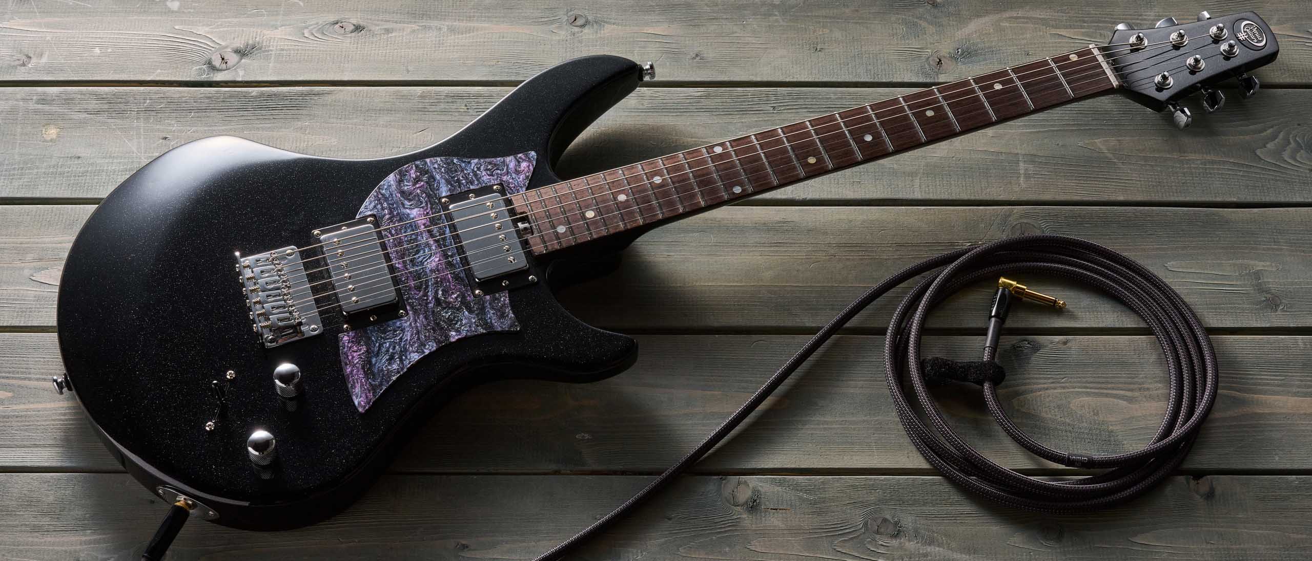 The Venus Revolution is a short-scale electric designed for female players and comes with swappable pickguards