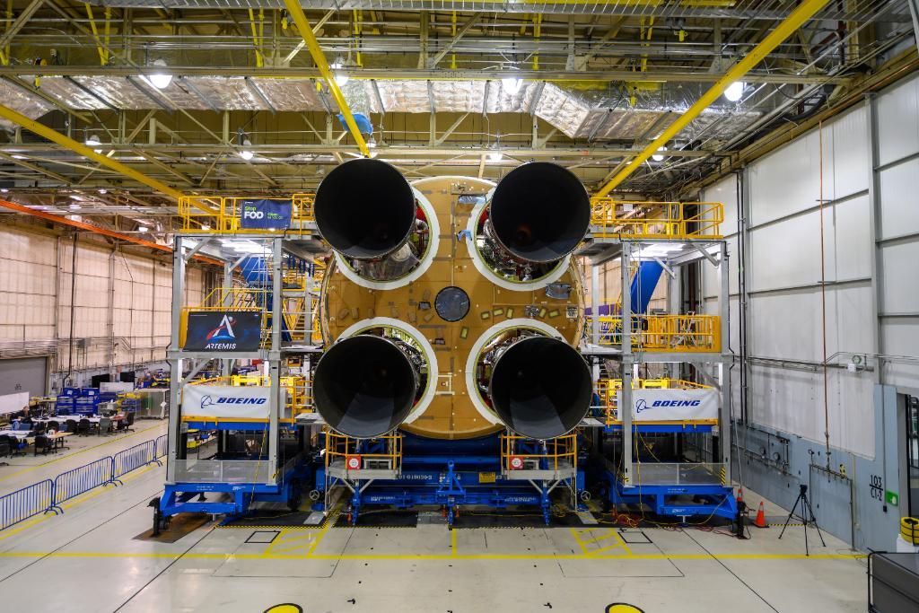 All four RS-25 rocket engines are seen attached to the first core stage of NASA's Space Launch System megarocket in the Michoud Assembly Facility in New Orleans, Louisiana.