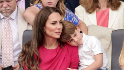 Kate, Princess of Wales and Prince Louis watch the Platinum Pageant for Queen Elizabeth II's Platinum Jubilee