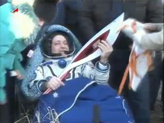 Russian cosmonaut Fyodor Yurchikhin holds the Olympic torch for the 2014 Winter Games in Sochi, Russia after landing back on Earth on a Soyuz TMA-09M spacecraft with crewmates Karen Nyberg of NASA and Luca Parmitano of the European Space Agency. The torch