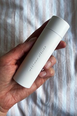 Katie holding Westman Atelier Skin Activator