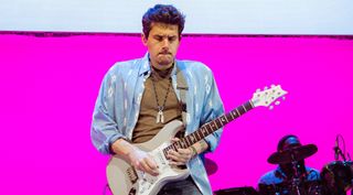 John Mayer performs onstage (using a US-built Silver Sky) at The O2 Arena on October 13, 2019 in London, England
