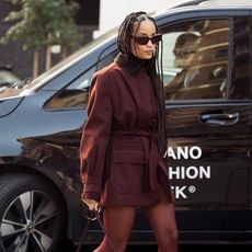 sai de silva wearing burgundy