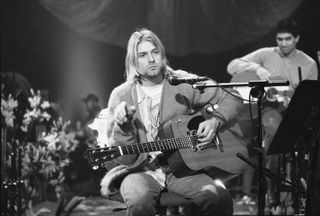 Kurt Cobain (left) and Pat Smear perform onstage with Nirvana at Sony Studios in New York City on November 18, 1993