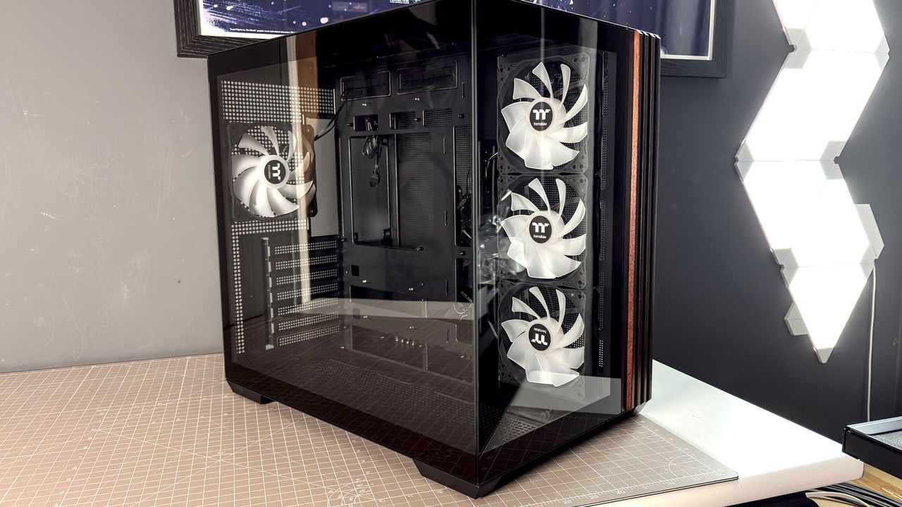 The Thermaltake View 380 WS ARGB on a desk with various components fitted.