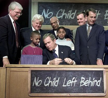 George W. Bush at a signing ceremony for the No Child Left Behind Act.