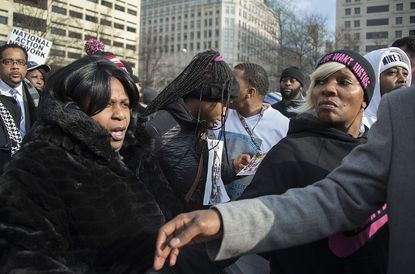 Samaria Rice, mother of Tamir Rice, marches through a rally in DC