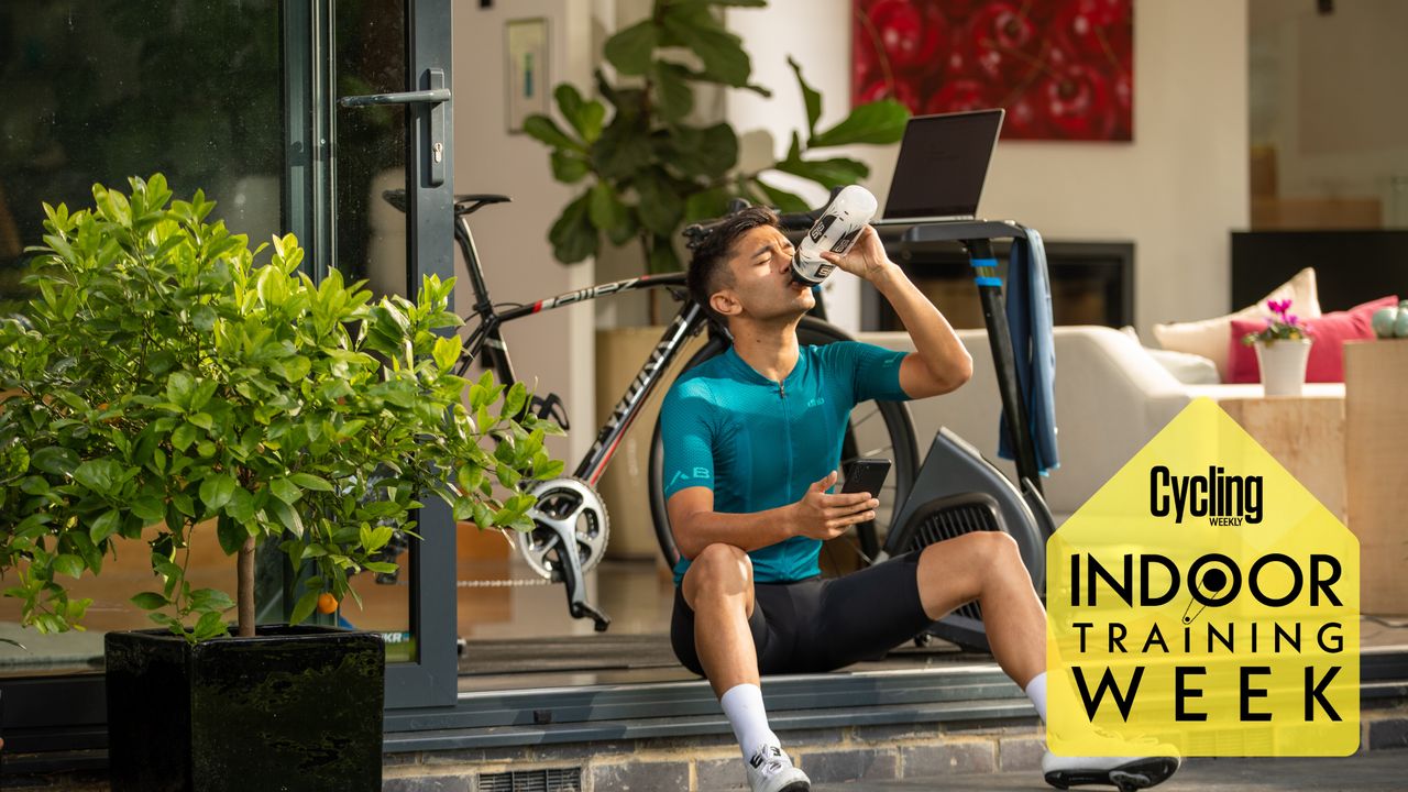 Cyclist takes a drink after session