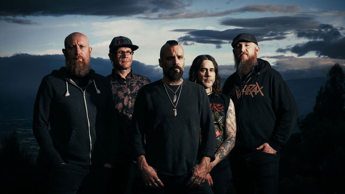 Killswitch Engage standing on a hill