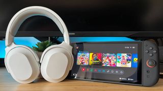 Photo taken by Tabitha Baker of the Razer Barracuda X gaming headset sitting next to the Nintendo Switch 2.