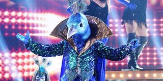 the masked singer peacock performing in the finale