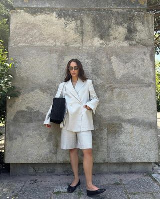 @deborabrosa in a linen blazer and shorts