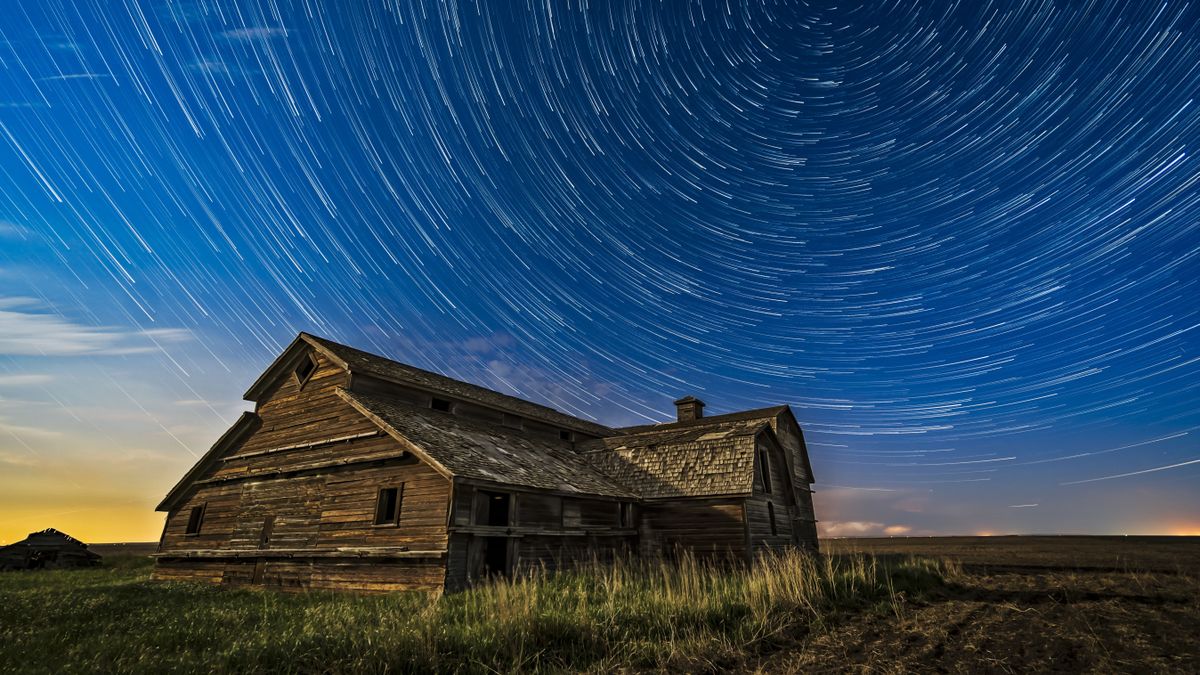 How to photograph star trails: Circumpolar star trails over a grand old barn in southern Alberta