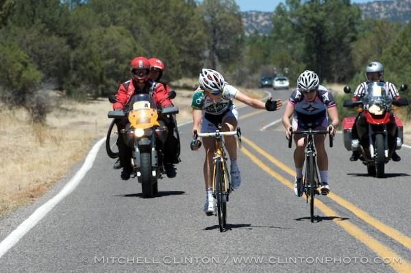 Heather-Logan Sprenger (Colavita/Forno d'Asolo) calls Anna Barensfeld (Missing Link Coaching Systems) through for a pull as they head down the Mimbres Valley