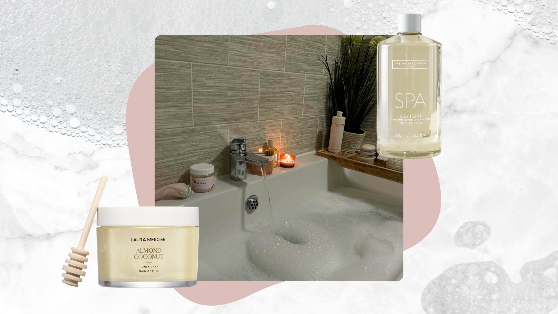 Image of a bubble bath with a lit candle on a white marble background with soapy details and a pink shape, plus the White Company Bath Soak and Laura Mercier Honey Bath