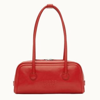 Flat lay image of a red handbag