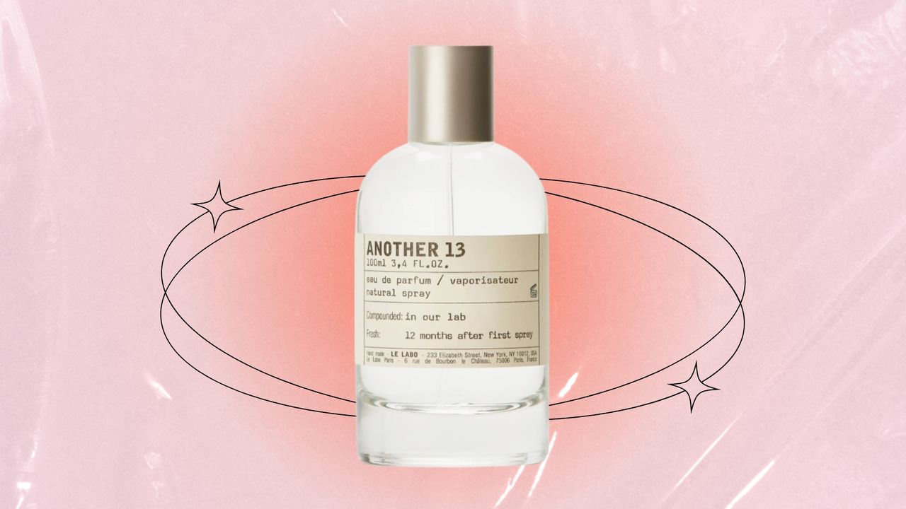 Le Labo Another 13 pictured in the centre of a pink/orange gradient circle, on a pastel pink template