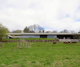 A single-storey countryside home on a sloped site