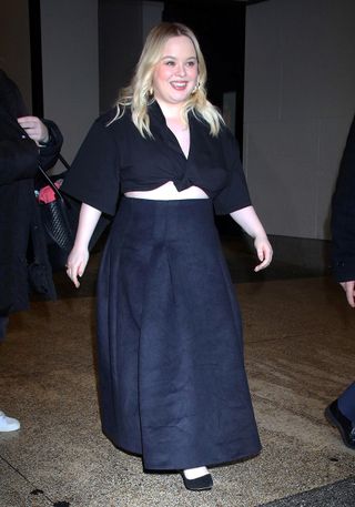 Nicola Coughlan wearing a skirt outfit.