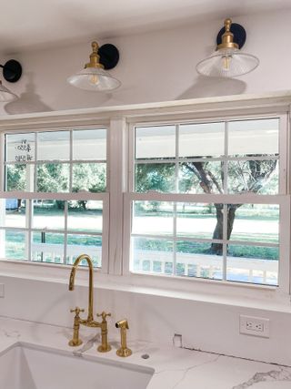 Three refinished wall sconces in kitchen