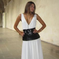 Influencer wears a corset belt.