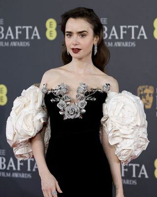 Lily Collins wearing a side parting at the BAFTAs 2024