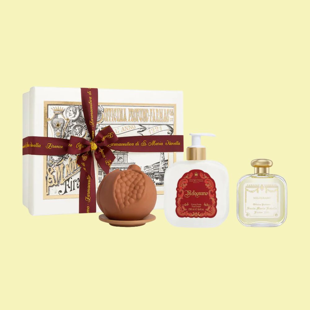 Santa Maria Novella Melograno Eau De Cologne Fragrance Gift Set (100ml) against pale yellow background.