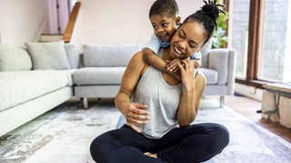 Mum with child about to do a workout