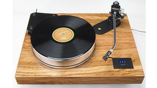 How does a vinyl record make a sound?