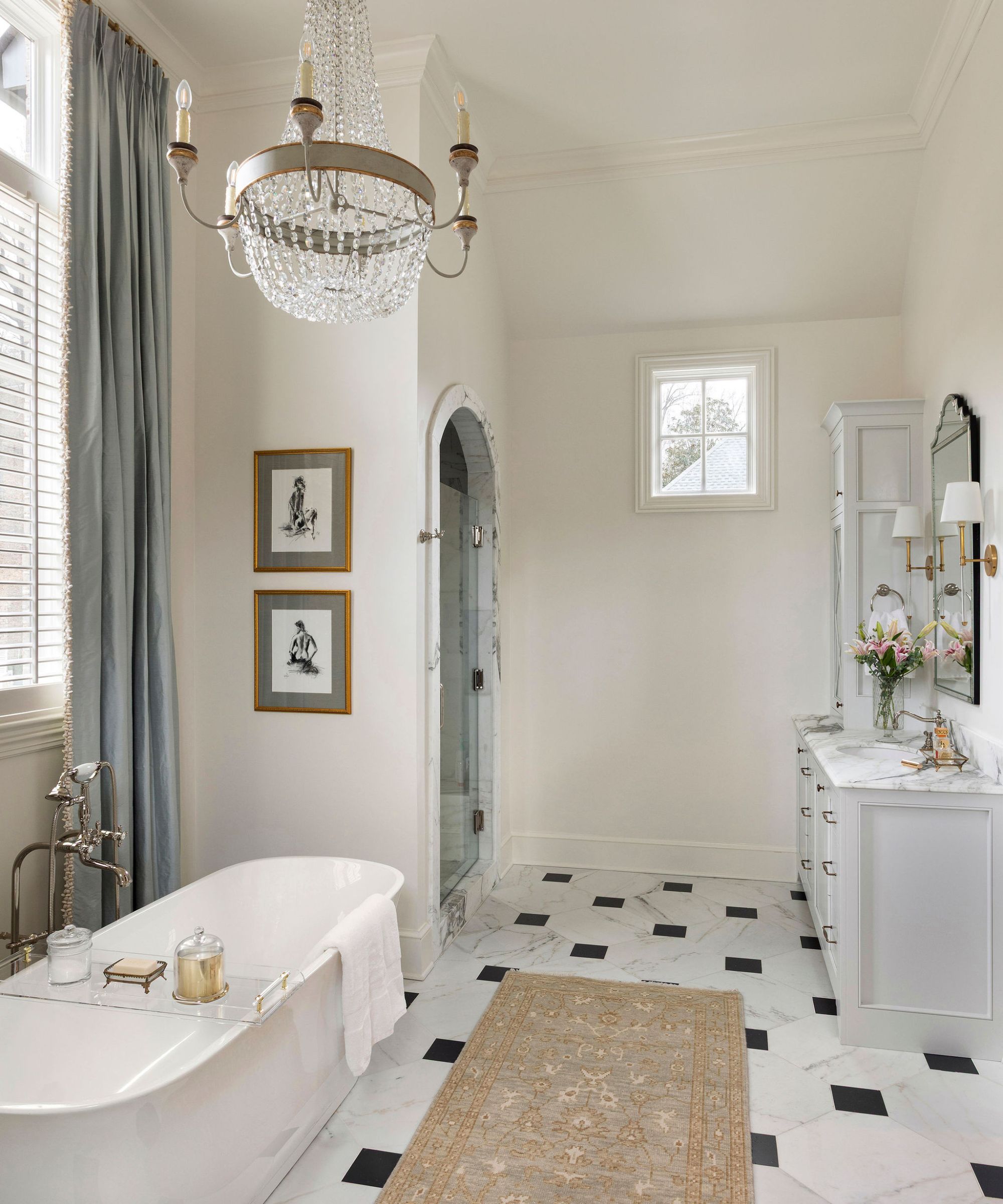 A neutral bathroom with a shower nook hidden in the corner