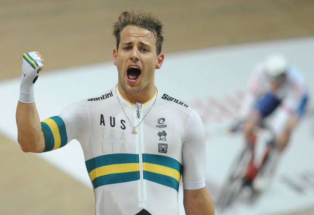 Australia's Samuel Welsford celebrates after winning the Men's Scratch Race