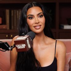 Kim Kardashian appeared on Call Her Daddy in a black tank top and matching leggings