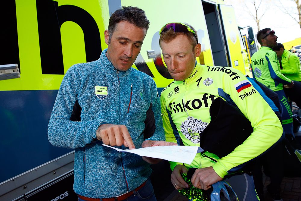 Astana's Jan Valach and Pavel Brutt check the details of today's ride.