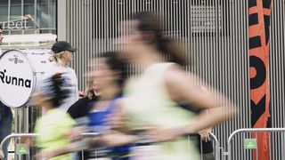 photos of runners in front of a Runna banner