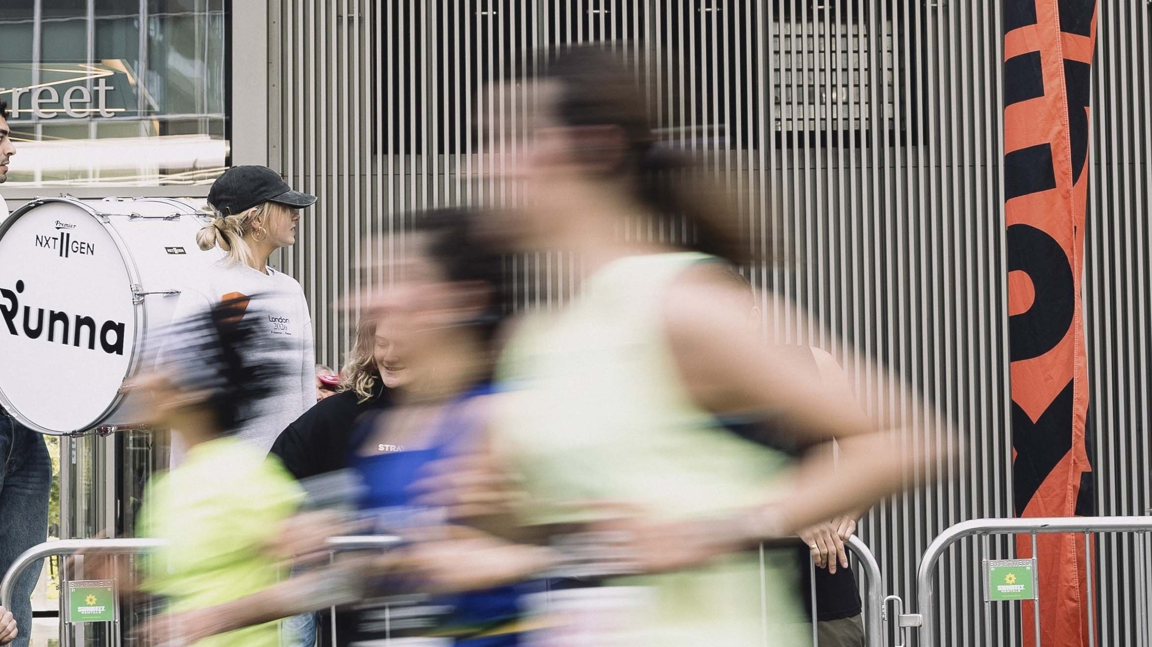 photos of runners in front of a Runna banner