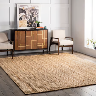 A jute rug in a neutral living room