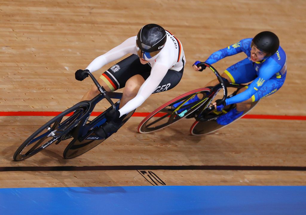 IZU JAPAN AUGUST 07 LR Lea Sophie Friedrich of Team Germany and Olena Starikova of Team Ukraine sprint during the Womens sprint quarterfinals race 2 heat 1 of the track cycling on day filthen of the Tokyo 2020 Olympic Games at Izu Velodrome on August 07 2021 in Izu Shizuoka Japan Photo by Justin SetterfieldGetty Images