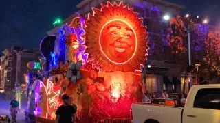 The Sun side of the Sun and Moon Float at Universal's Mardi Gras 2024 parade.