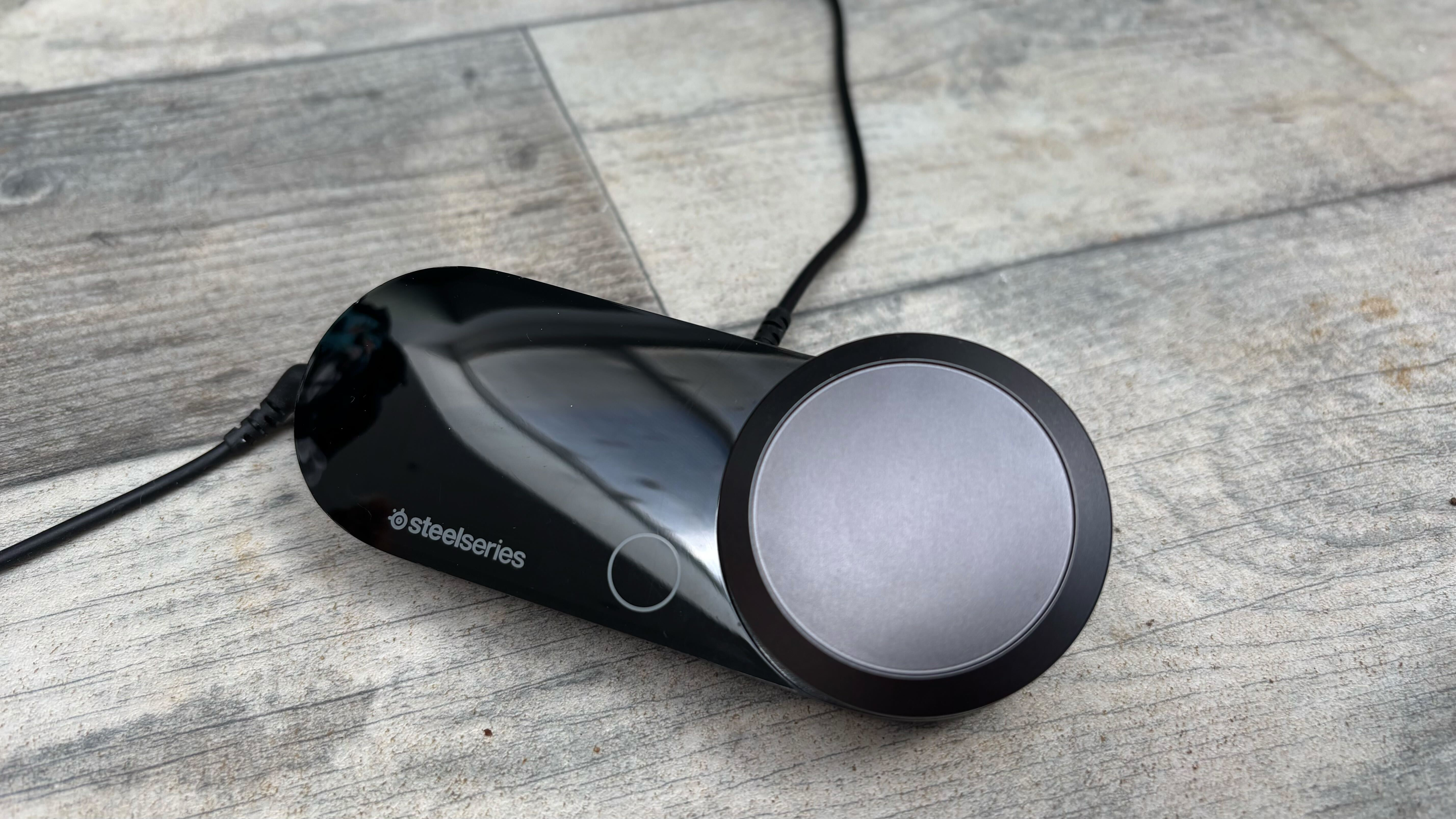 SteelSeries Arctis Nova Pro on a wooden surface