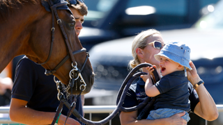 Zara Tindall and son Lucas Tindall attend day 3 of the 2022 Festival of British Eventing at Gatcombe Park on August 7, 2022 in Stroud, England