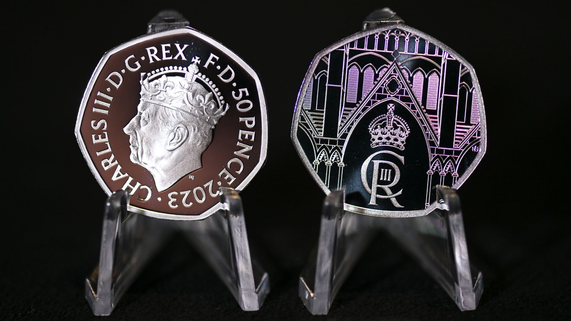 King Charles&#039;s commemorative 50 pence coin seen at the Royal Mint in 2023