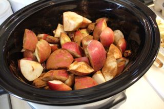 Preping apples in a slow cooker to test the Vitamix Immersion blender