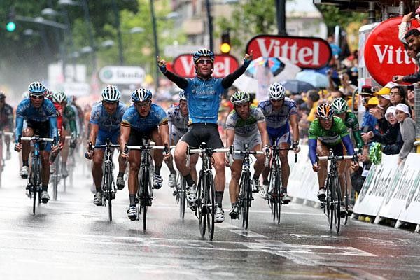 Cav is the only who smiles while the sprinters look dejected, including his team-mate Ciolek.
