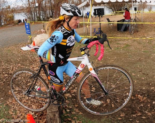 Christina Begy (Gate Carbon Drive) running across some railroad ties