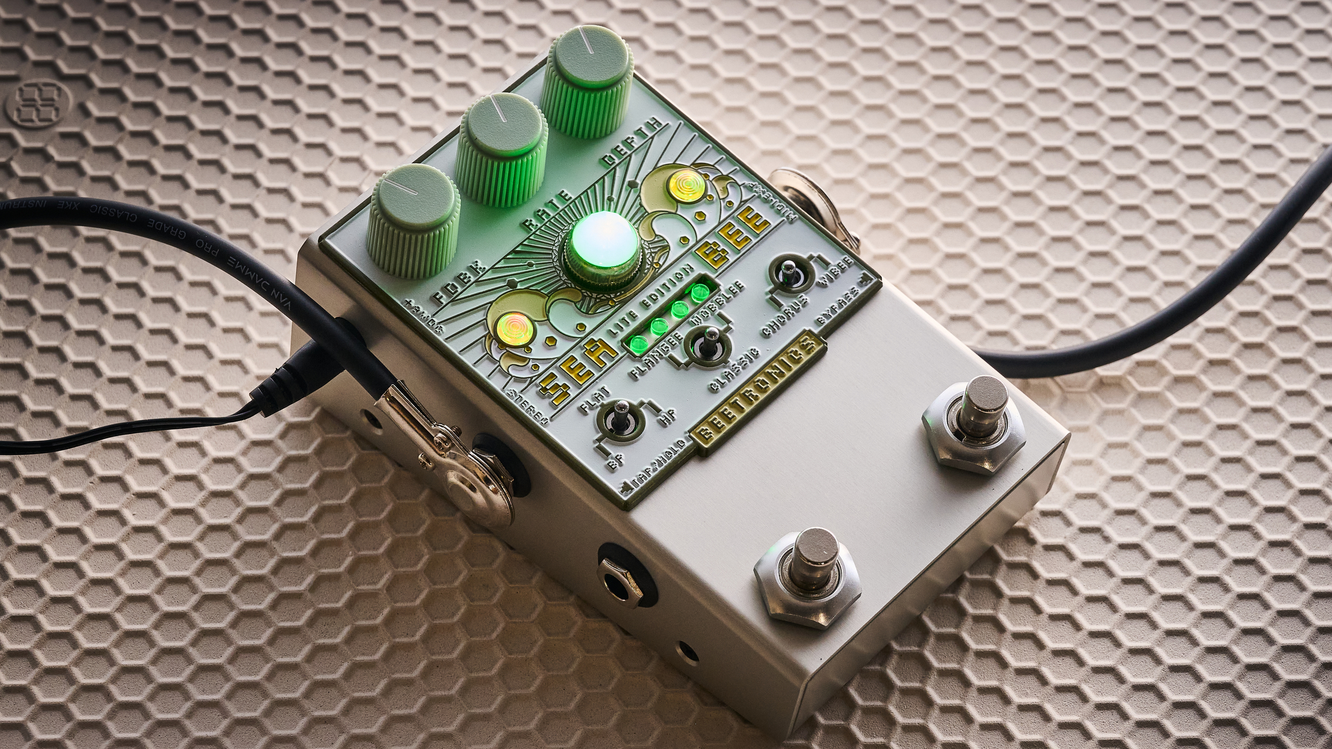 A Beetronics Seabee Lite chorus pedal on a honeycomb rubber mat